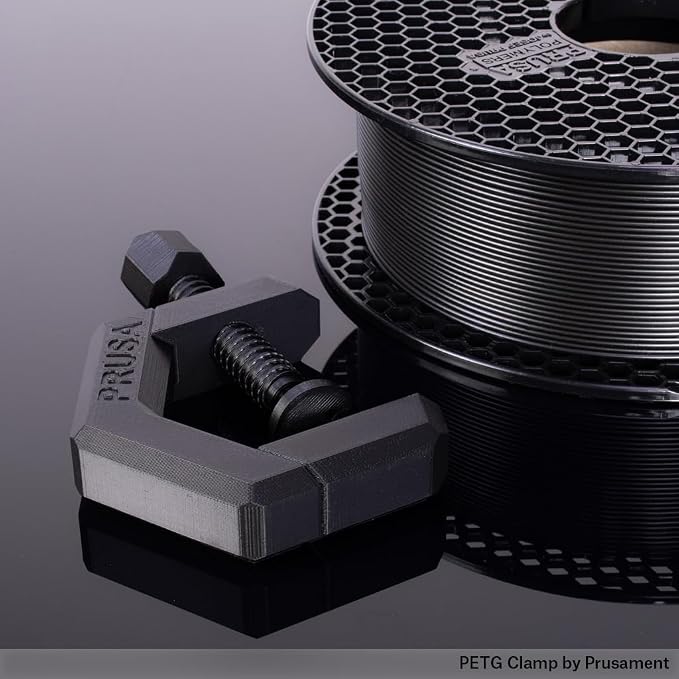 Prusament Premium PETG Matte Black 1.75mm 1kg 3D Printer Filament | PETG filament with ±0.02 mm precision, low stringing, strong layer adhesion, and reliable tangle-free printing.