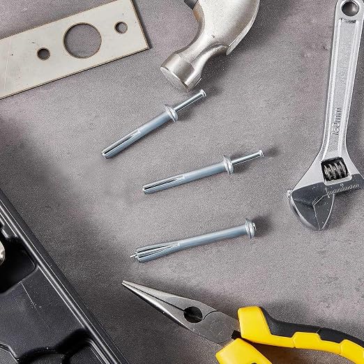 Dunzy 100 Pcs Drive Nail in Anchor Drive Expansion Cement Hammering Anchors Pin Rustproof Zinc Plated Concrete Nails Heavy Duty for Metal Brick Drywall Wood, Hammer Fasteners Kit (1/4" X 1-1/4")